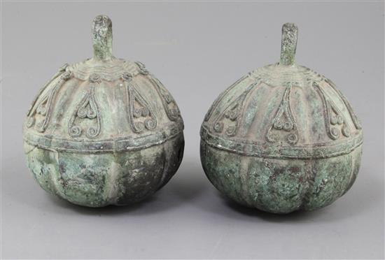 A pair of Chinese bronze bells, possibly Tang dynasty, 11.5cm